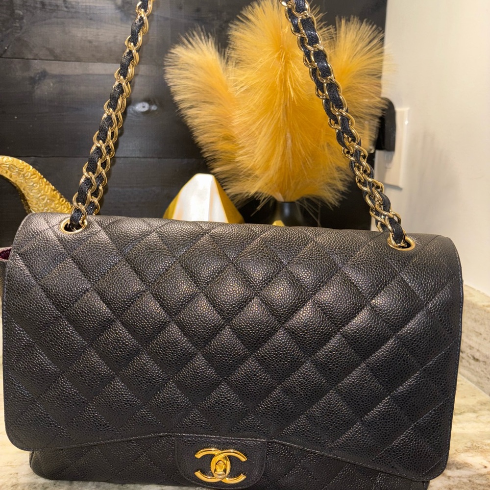 CHANEL Black Quilted Shoulder Bag with Gold Accents